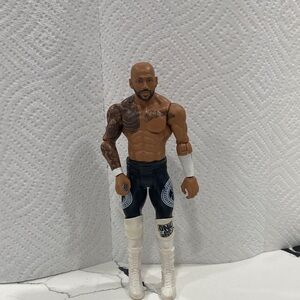 WWE Action Figure with Black Pants and White Boots